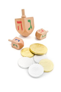 Dreidel and gelt clipart