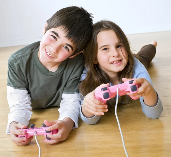 Boy and girl playstation — Stok Foto