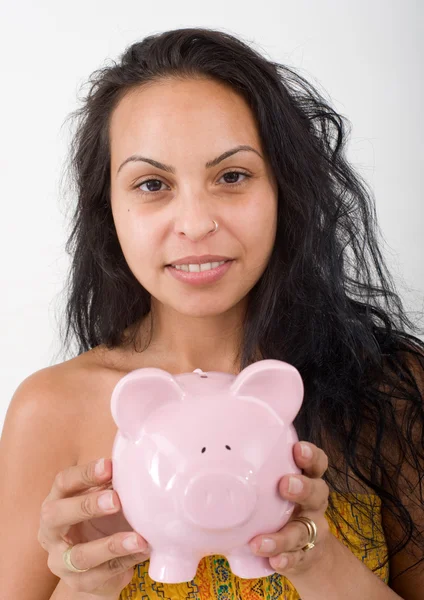 Hispanic woman and piggybank — Stock Photo, Image