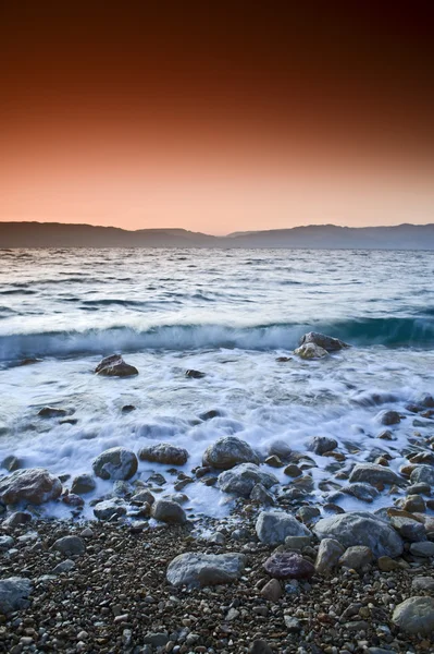 Salida del sol sobre el mar muerto — Foto de Stock