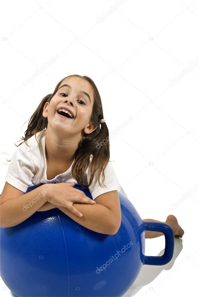 Young girl on a space hopper