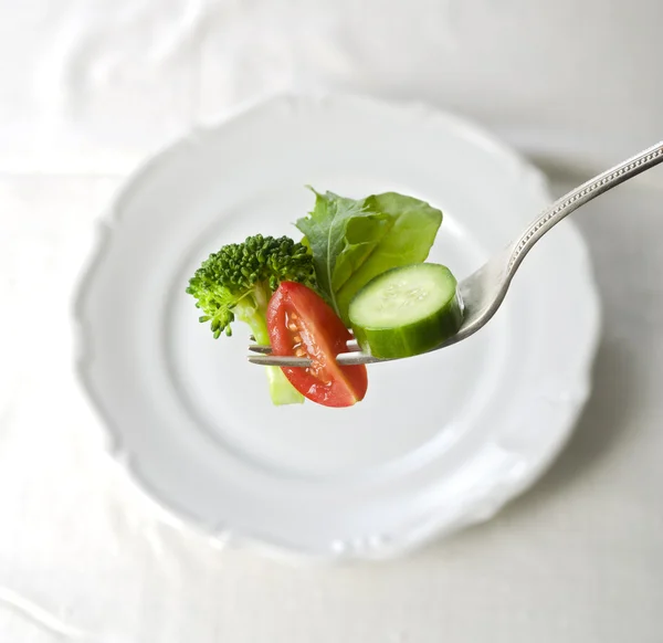Salad on fork — Stock Photo, Image