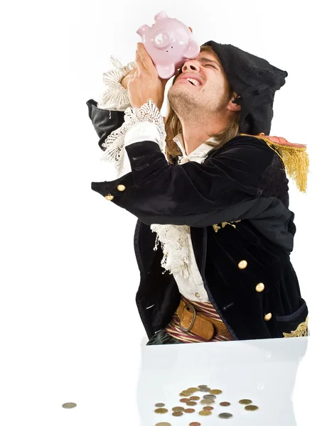 Пират и копилка — стоковое фото