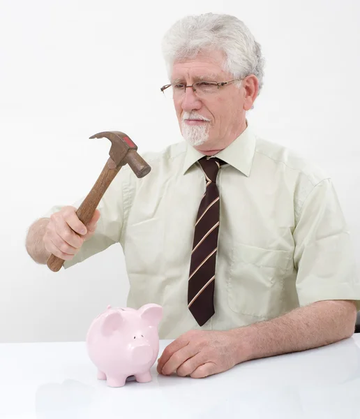 Senior man en spaarpot — Stockfoto