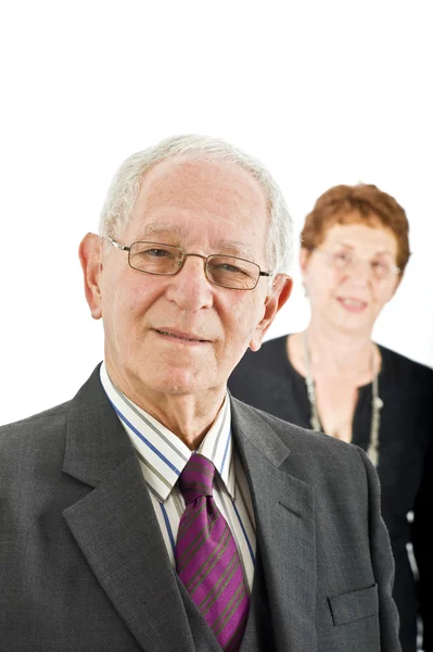 Senior businessman and with colleague in the bac — Stock Photo, Image