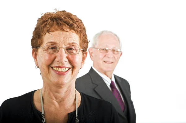 Senior businesswoman and with colleague in the b — Stock Photo, Image