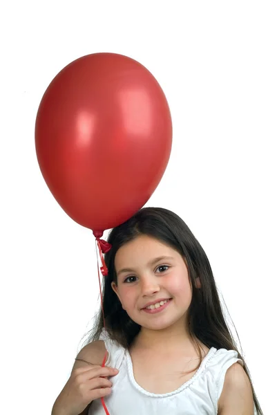 Lány és egy piros léggömb — Stock Fotó