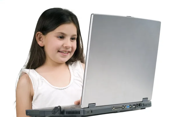 Littel chica con ordenador portátil — Foto de Stock