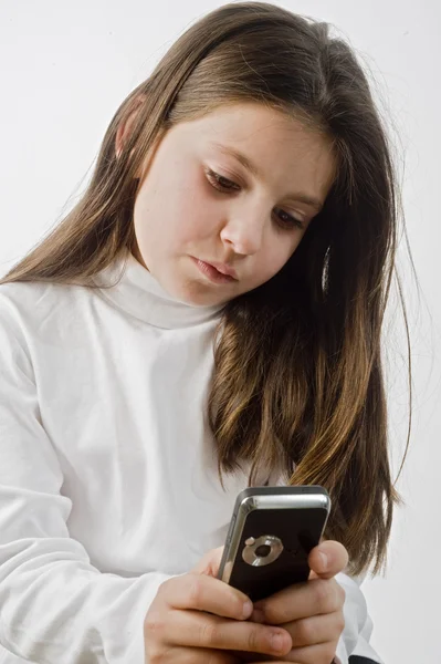 Девушка и мобильный телефон — стоковое фото