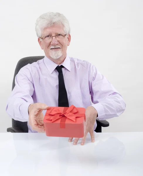 Bussinesman and gift — Stock Photo, Image