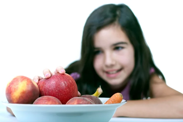 Девочка и яблоки — стоковое фото