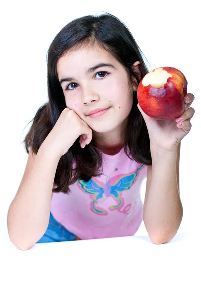 Девочка и яблоко — стоковое фото