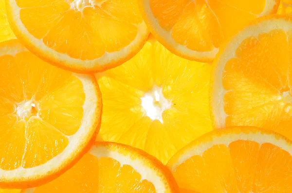 Fresh orange fruits background Stock Photo