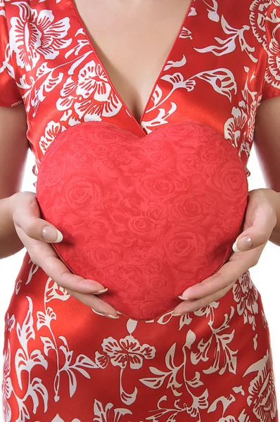 stock image Woman holds a heart opposite the bust