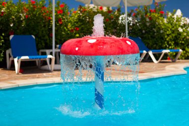 Fountain in children pool 1 clipart