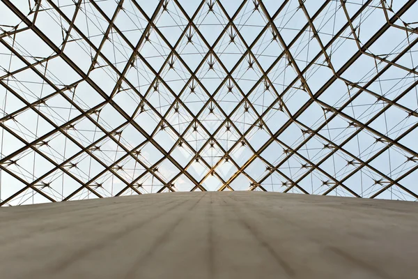 stock image Glass dome of a pyramid in the Louvre