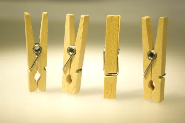 Four clothespins — Stock Photo, Image