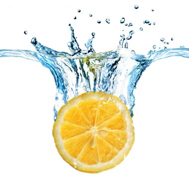 Fresh lemon dropped into water clipart