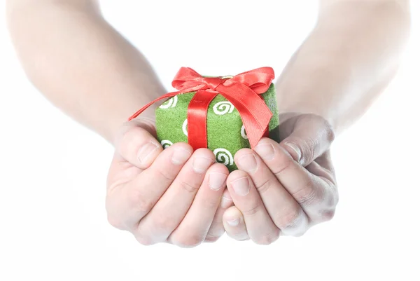 Hand holding geschenk — Stockfoto