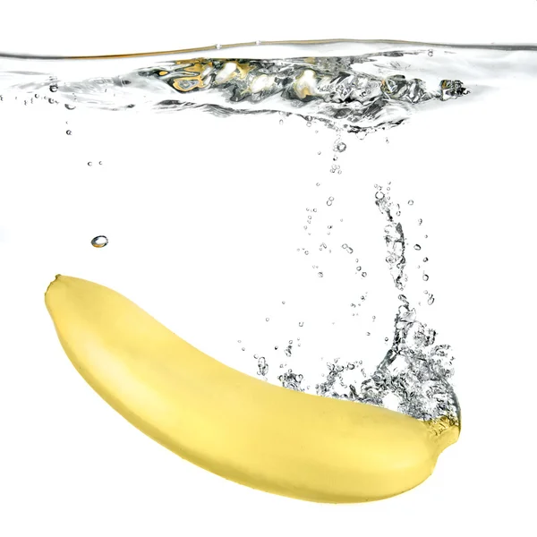 Banán, spadl do vody — Stock fotografie