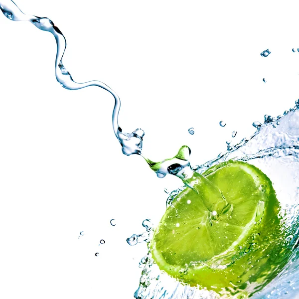Fresh water drops on lime Stock Picture