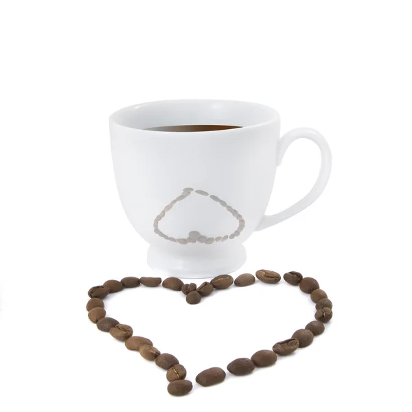 Xícara de café com grãos de café — Fotografia de Stock