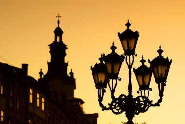 Silhouettes of city lantern clipart