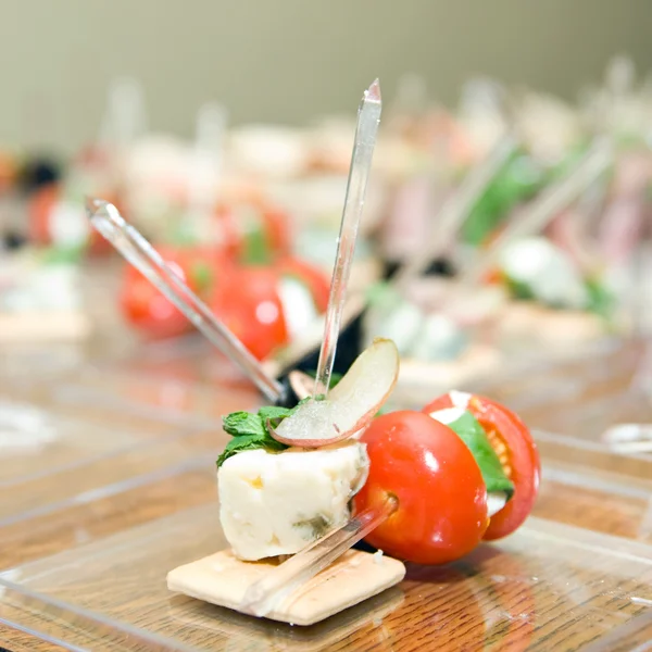 stock image Appetizer from tomato and cheese