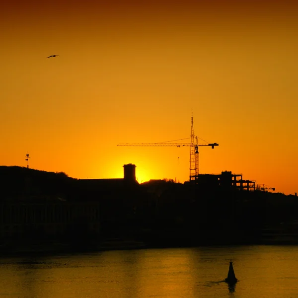 stock image City silhouette on sunset