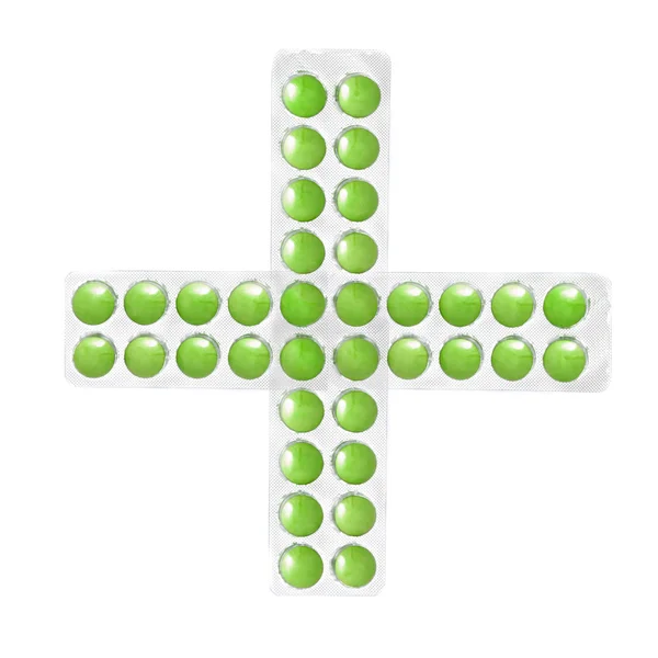 Krzyż z opakowania tabletek zielony — Zdjęcie stockowe