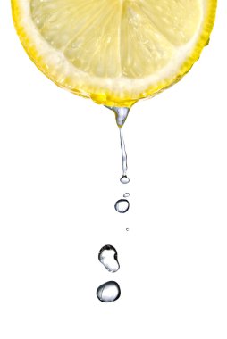 Fresh lemon slice with water drops clipart