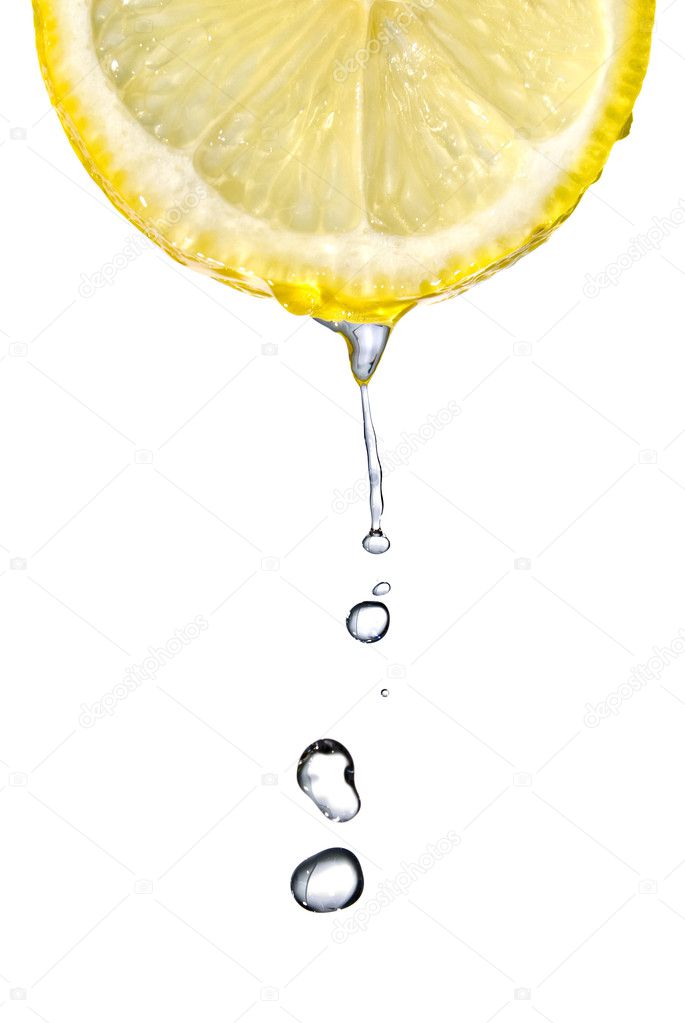 Fresh lemon slice with water drops