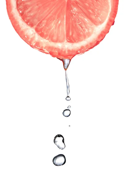 Fresh grapefruit slice with water — Stock Photo, Image