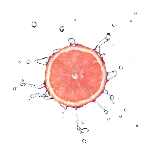 Slice of grapefruit with water — Stock Photo, Image