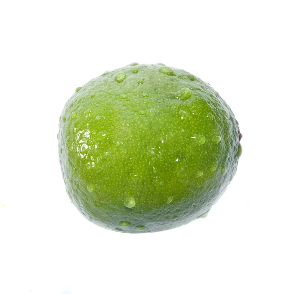 Zielone limonki z wody spadnie — Zdjęcie stockowe
