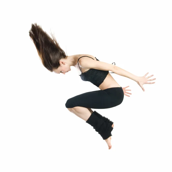 Saltando jovem dançarina isolada — Fotografia de Stock