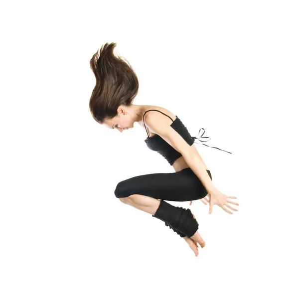 Genç dansçı üzerinde beyaz izole atlama — Stok fotoğraf