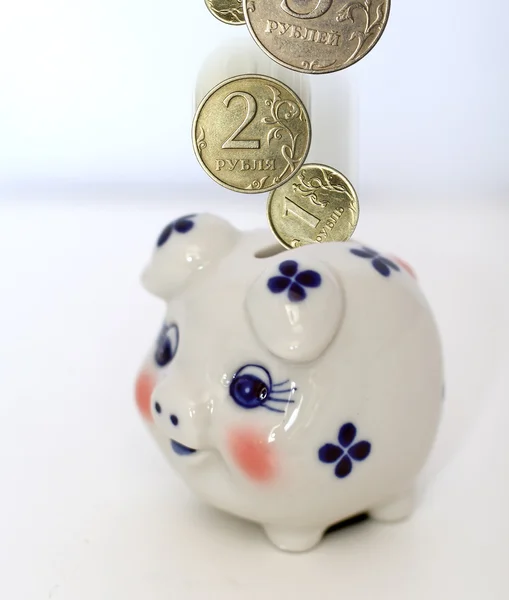 Coins and money box — Stock Photo, Image