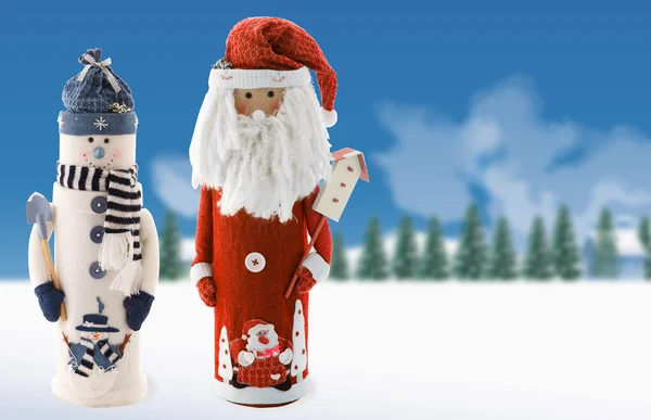 Сніговик і Санта на фоні — стокове фото