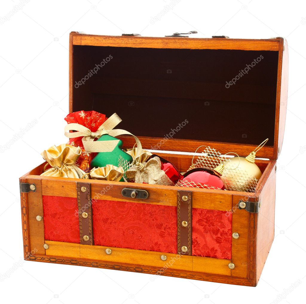 Open wooden trunk with gifts