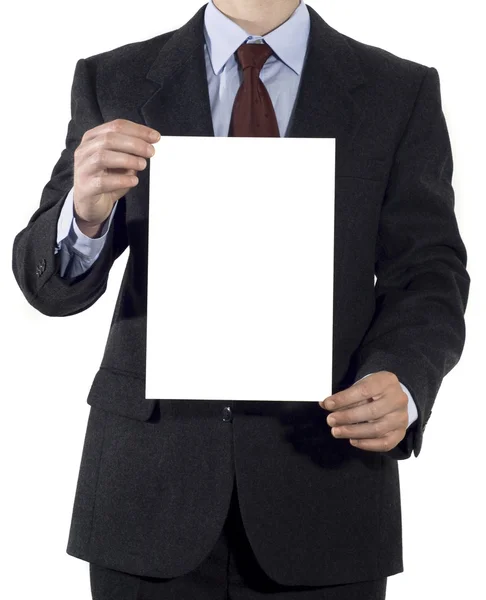 Man in suit with blank sheet of paper — Stock Photo, Image
