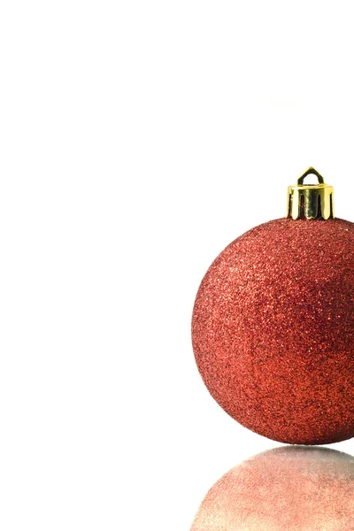 Christmas greetings - single red ball — Stock Photo, Image