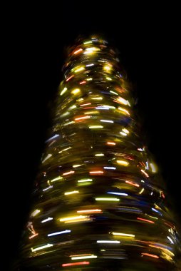 Blurred rotating New Year tree clipart