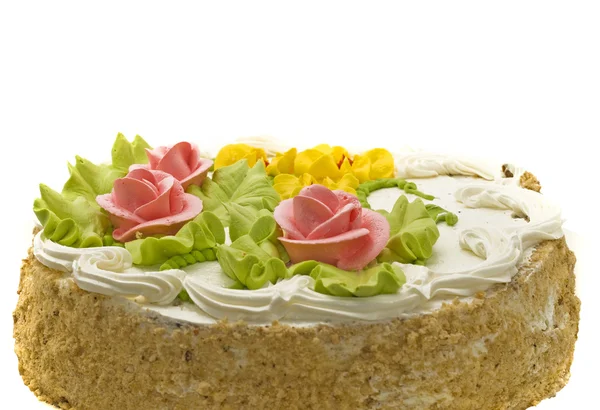 Tasty cake with cream, pink roses — Stock Photo, Image