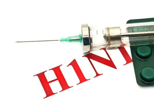 Świńskiej grypy h1n1 - tabletki i syrin — Zdjęcie stockowe
