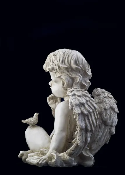 Vista lateral do pequeno anjo — Fotografia de Stock