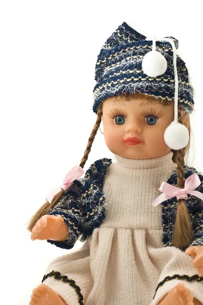 Hübsche Puppe mit langen Zöpfen — Stockfoto
