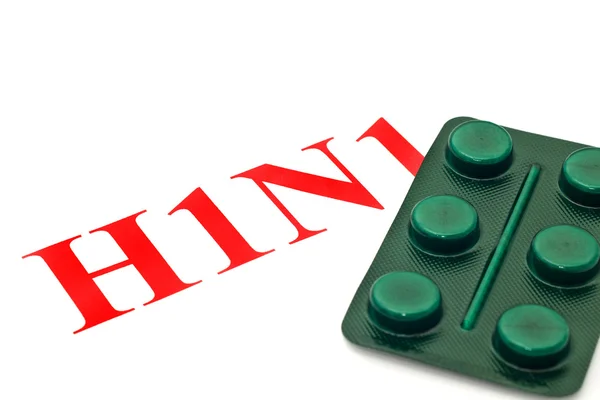 H1N1 - Крупный план зеленых таблеток — стоковое фото