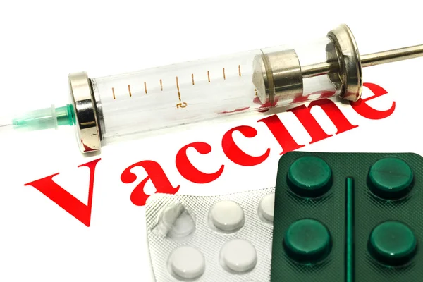 FLU H1N1 disease - tablets and syringe — Stock Photo, Image