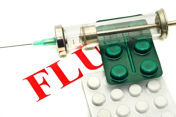 Disease alert - pills and syringe — Stock Photo, Image